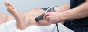 patient having shockwave therapy